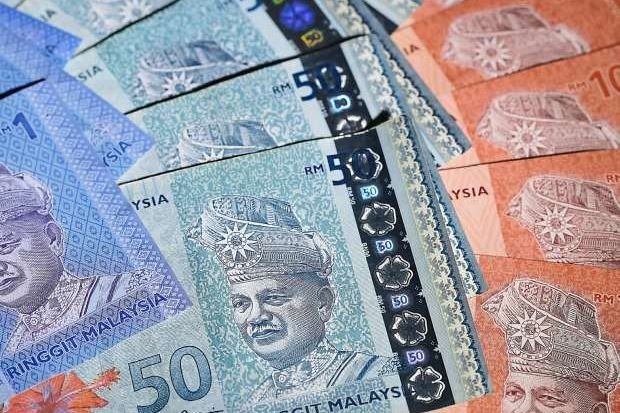 Ringgit opens lower against US dollar