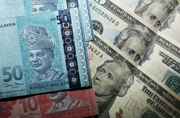 Ringgit opens lower against US dollar