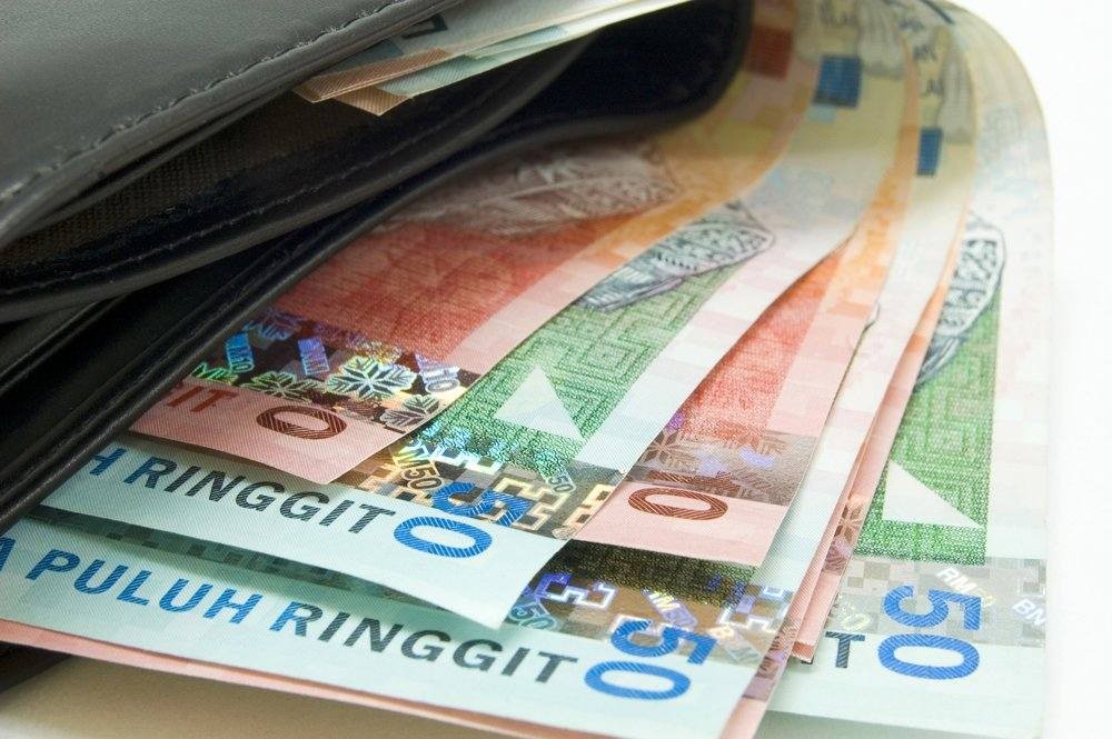 Ringgit up against greenback, yuan weakens